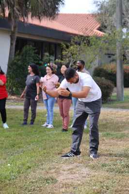 people tossing eggs