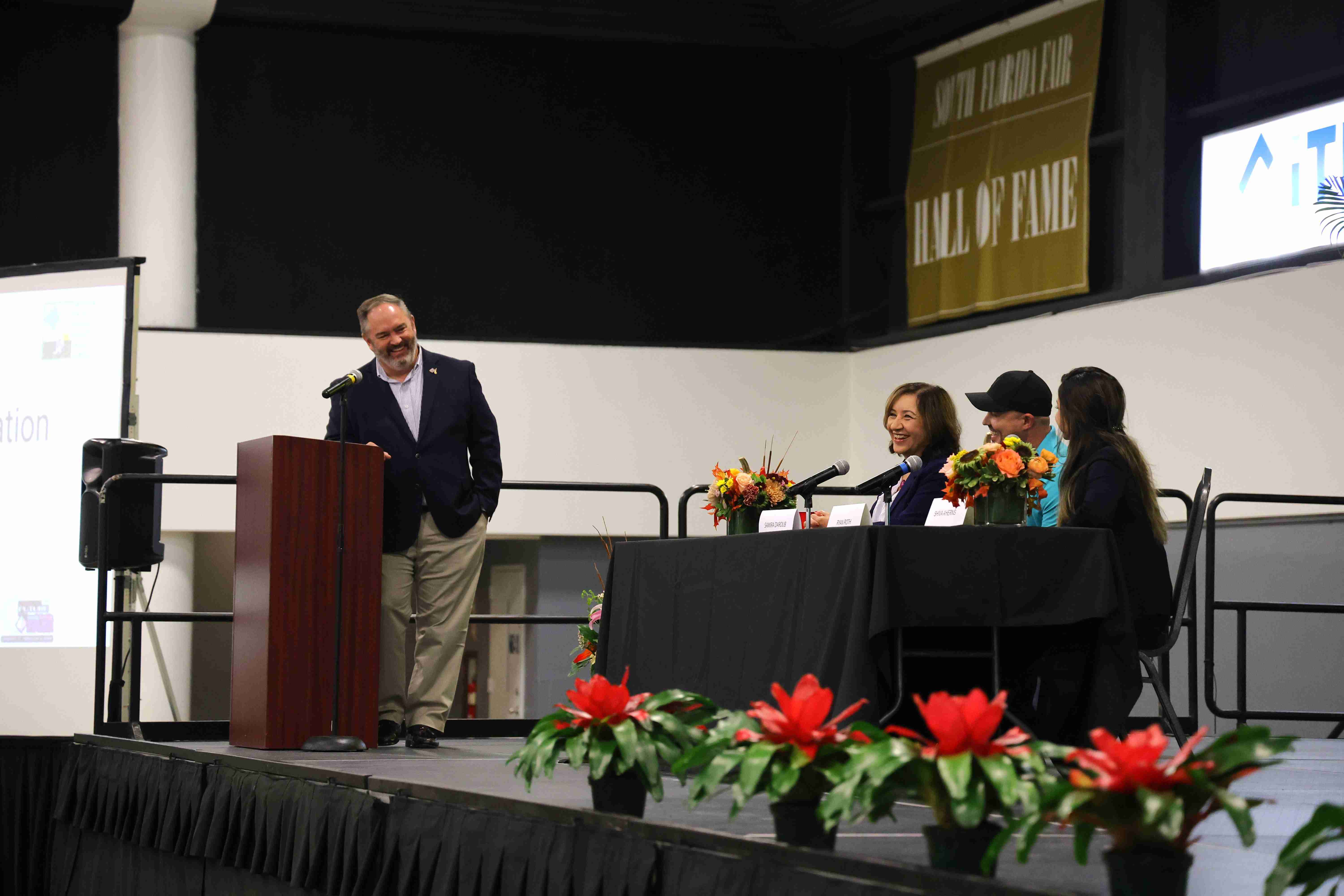 four people on a stage